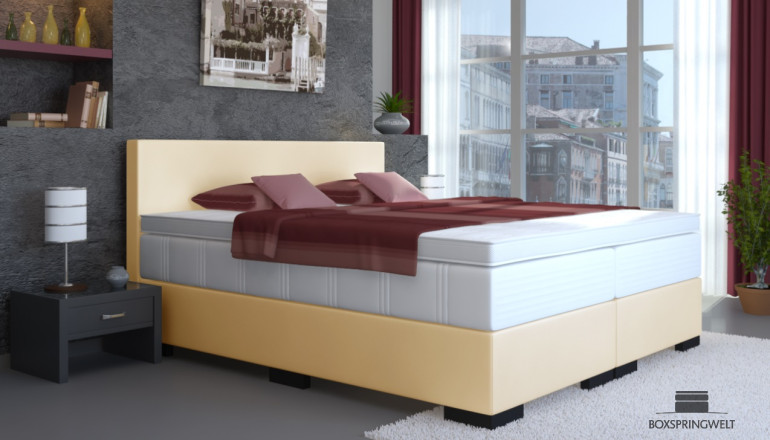 Lit Boxspring Tony en similicuir 120 x 210 cm en crème